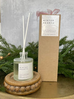 Winter Hearth Reed Diffuser 5 oz (ginger + cinnamon + pine)